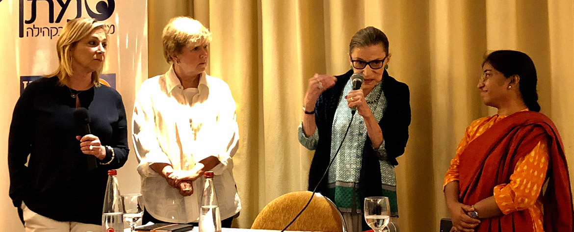 Justice Ginsburg speaks to attendees of the Genesis Prize Foundation Women's Empowerment and Violence Prevention Conference as Senior Advisor to the Genesis Prize Foundation Chairman Jill Smith and keynote speakers Jane Lute and Dr. Sunitha Krishnan look on